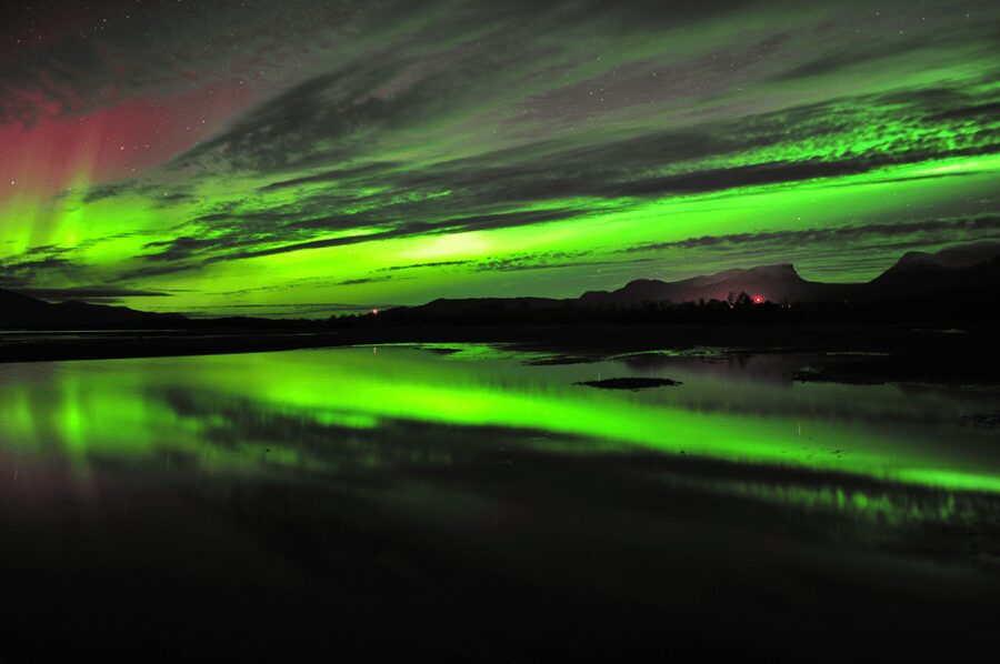 Abisko: Guided Autumn Aurora Chase with Hotel Transfers - Björkliden and Bear Mountain viewpoints
