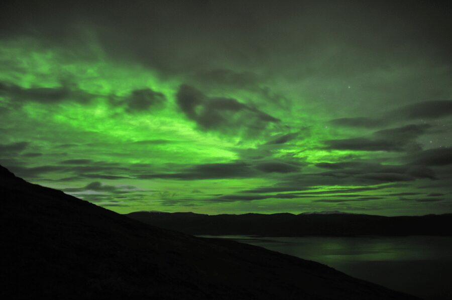 Abisko: Guided Autumn Aurora Chase with Hotel Transfers - The Torne River and remote northern views