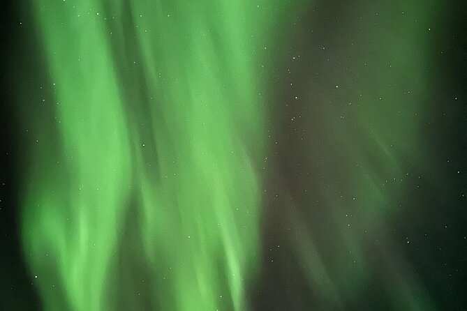 Alta: The Northern Lights Bus – a comfortable Arctic journey - Stopping for pictures under uncertain skies