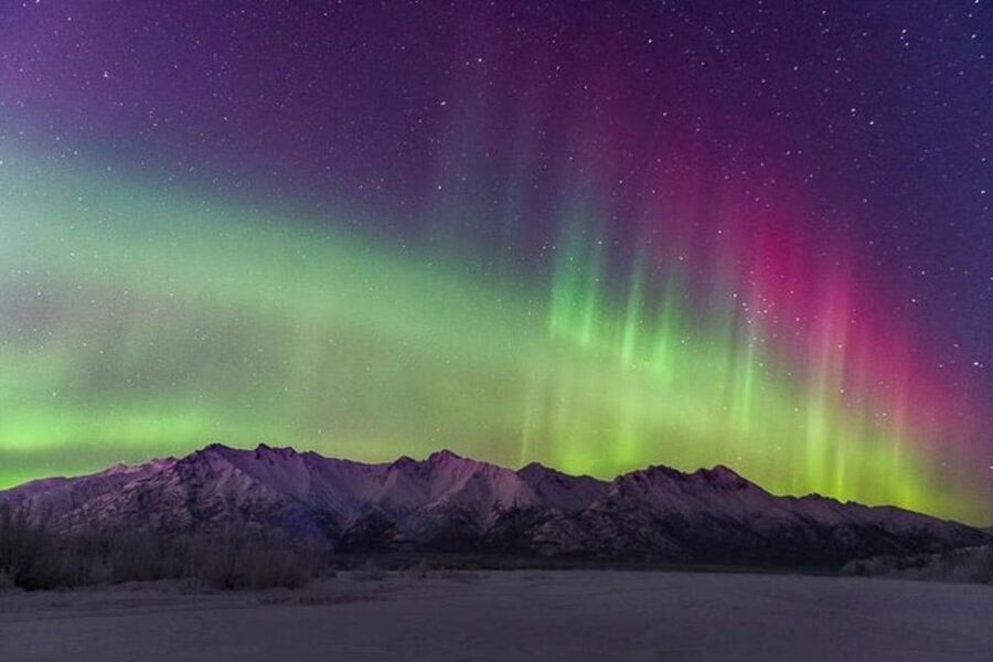 Anchorage: Aurora Borealis Northern Lights Photography Tour - Searching for a clear sky across snowy scenery