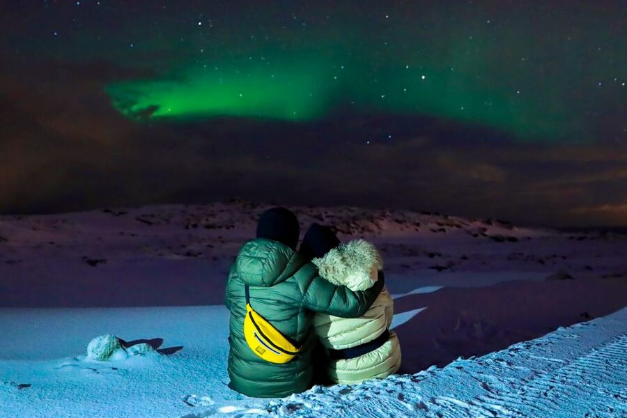 From Reykjavik: Northern Lights Bus Tour with Hot Cocoa - The free retry policy matters