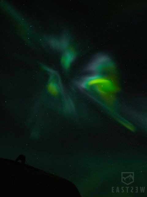 From Reykjavik: Northern Lights Tour with Hot Cocoa & Photos - Moving between locations when the sky refuses to cooperate