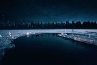 Ice Floating under Aurora Borealis