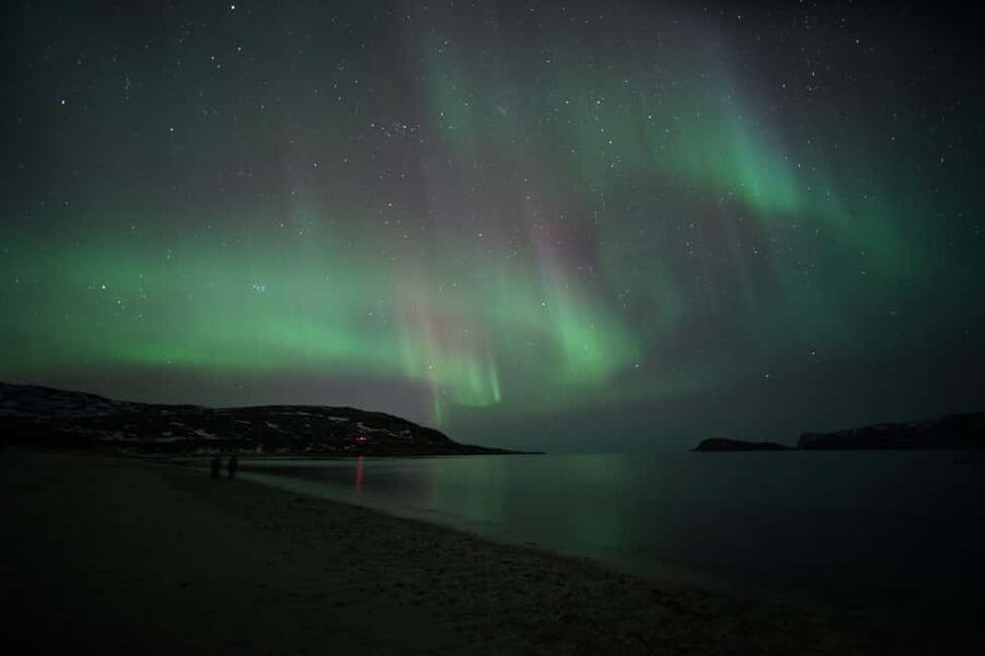 From Tromsø: Aurora Bus Tour with Snacks, Photos, and Drinks - The first stop: weather, stories, and the long wait