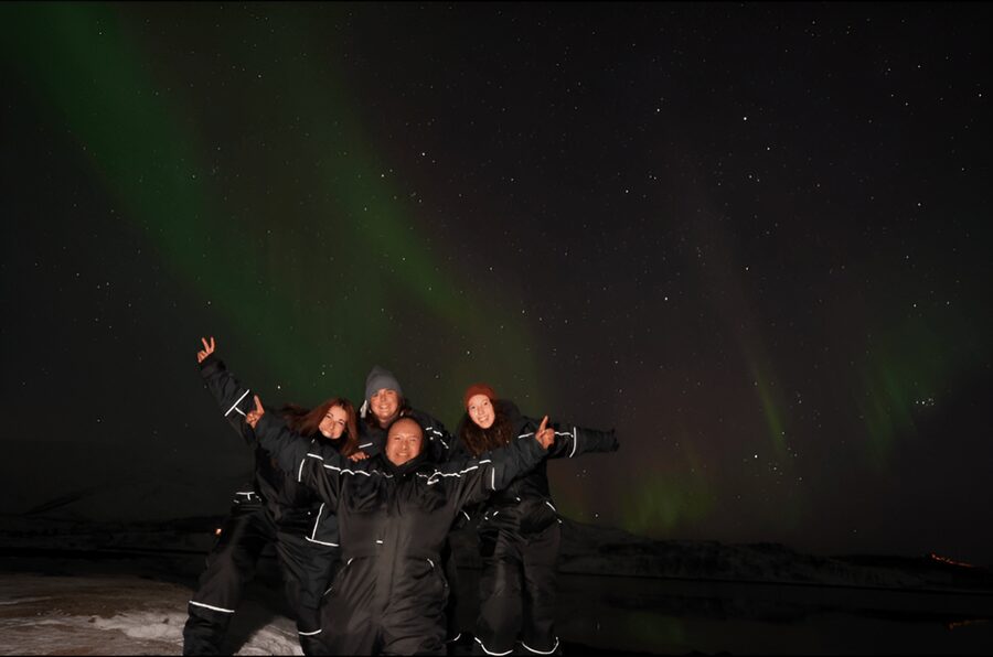 From Tromsø: Northern Lights Tour in Minibus with Photos - Chasing clear skies beyond Tromsø