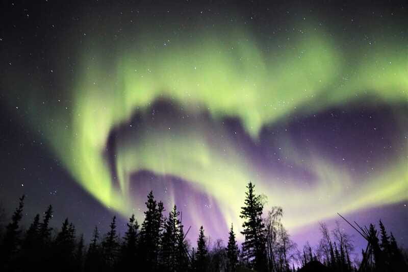 From Yellowknife: Northern Lights Bus Tour with Photos - Stop two: changing position for a better chance
