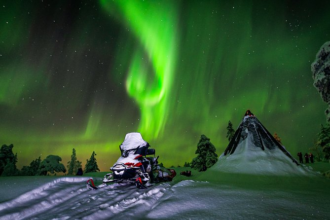 Hunting Northern Lights by Snowmobiles - Riding into Saariselka’s dark wilderness