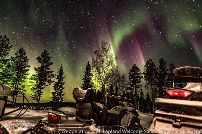 Hunting Northern Lights by Snowmobiles - What you might see above the fire