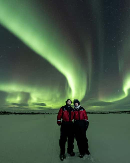 Kilpisjärvi: Northern Lights Snowmobile Tour with Photos - Reaching the lake beneath the northern sky