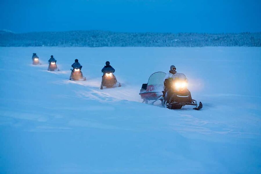 Kiruna: Northern Lights Snowmobile Tour with Transfer - From Kiruna pickup to the snowmobile base