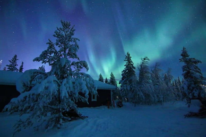 Kiruna: Snowshoe Trek with Aurora Hunt and Warm Beverage - Getting dressed for a Kiruna winter evening