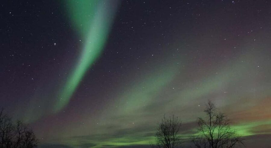 Luleå: Snowmobile Adventures & Northern Lights Hunt - Getting dressed for Arctic night riding