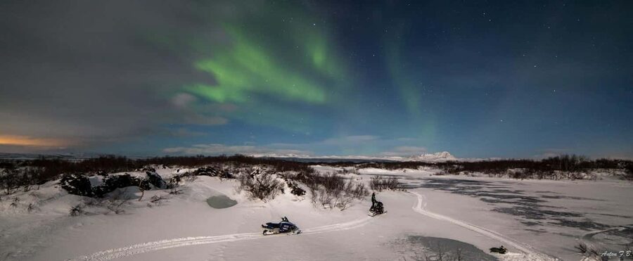 Mývatn: Northern Lights Snowmobile Tour - Riding through black lava and white snow