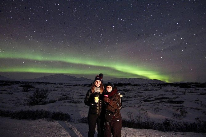 Northern Lights and Stargazing Small-Group Tour with Local Guide - Waiting outside in Icelandic winter