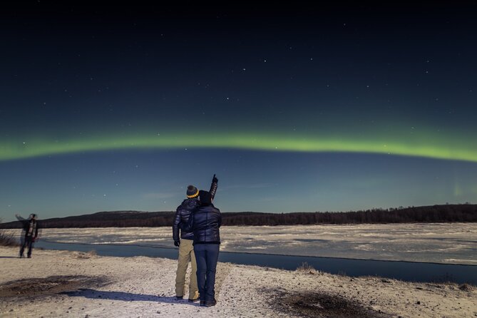 Northern lights hunting photo tour with bbq; small groups - Leaving Rovaniemi after dark