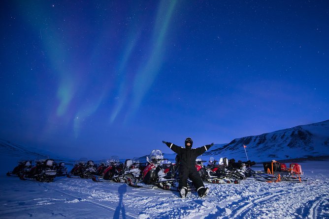 Northern Lights Hunting with Snowmobiles - Following the forest route into the Arctic night