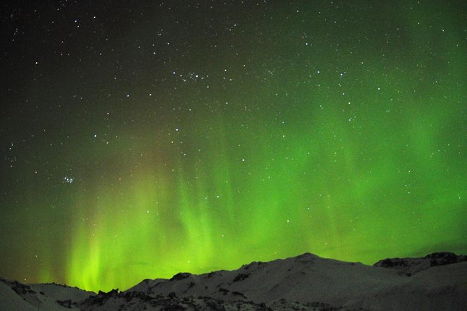 Northern Lights Minibus Tour with Hot Cocoa, Blankets & Photos - Leaving Reykjavik after dark