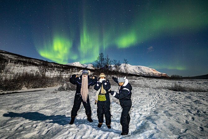 Northern Lights Minibus with Photos Dinner Warm suits - Following the aurora away from city lights