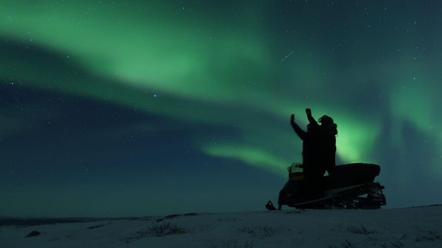 Premium Aurora Snowmobile Ride With Panoramic Views - Getting fitted for an Arctic night
