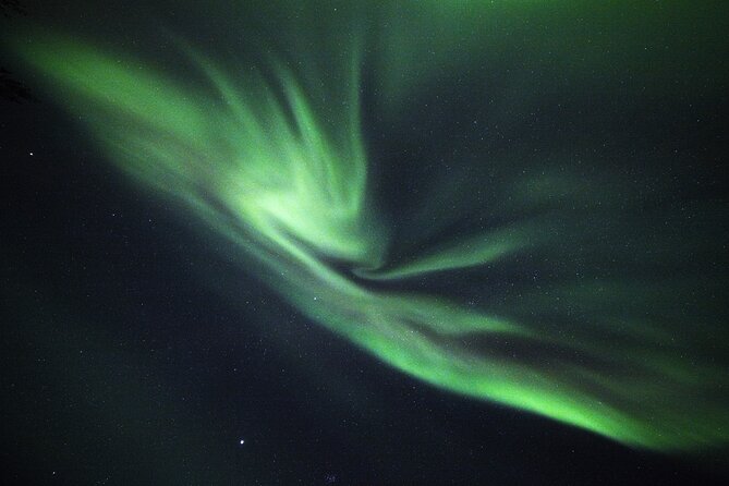 Private Group: Northern Lights Hunt 4x4 SUV with Aurora guarantee - Fire, food, and a warmer side of the Arctic