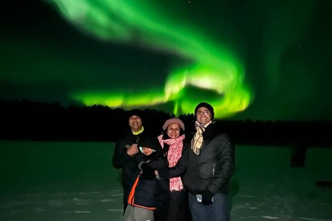Private Northern Lights Expedition by Lapland's Experienced Team - Snow Scooters Add Energy for Families
