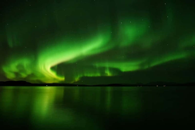 Reykjavik: Northern Lights Adventure Tour with Hot Chocolate - Leaving Reykjavik’s city glow