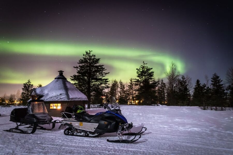 Rovaniemi: Aurora Borealis Snowmobile Safari with Campfire - Riding through the Lappish night