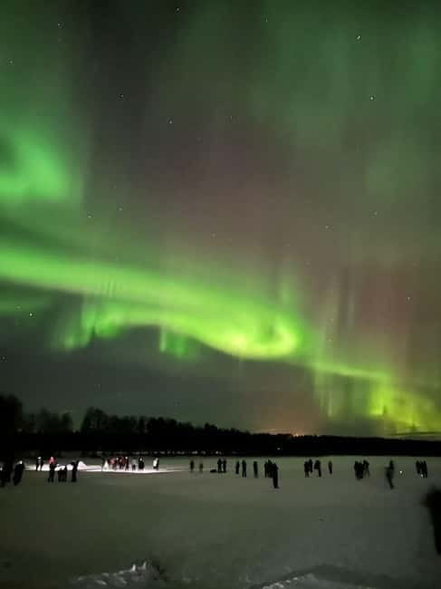 Rovaniemi: Northern Lights Hunters. Aurora + BBQ - Santa Claus Village is best after dark
