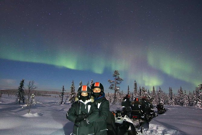 Snowmobile Aurora Expedition with dinner - Riding through forests, lakes, and river ice