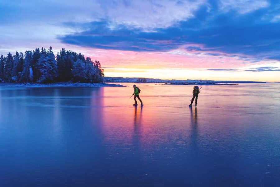Stockholm: Ice Skating with fire & chance of Northern Lights - Campfire food, glögg, and a proper warm-up