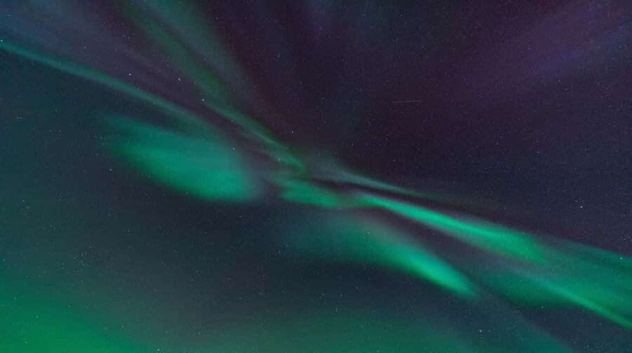 Tromsø: A Sámi Survival Story and Aurora Hunt - Leaving Tromsø in a heated blue-grey van
