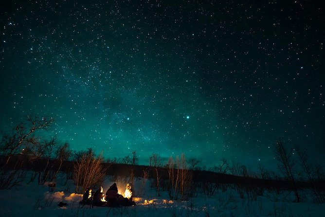 Tromso Aurora Hunt with Bonfire, Soup, Winter Gear & Transfers - Seeing the lights with your eyes and camera