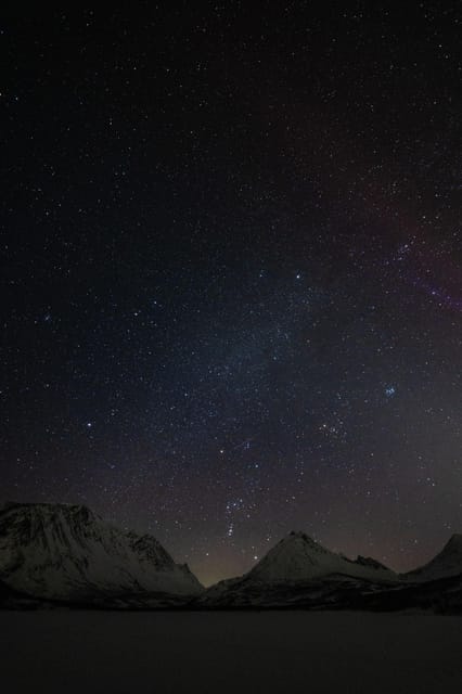 Tromsø: Aurora Tour with Photos, Campfire and Arctic Food - Staying warm on the Arctic shore