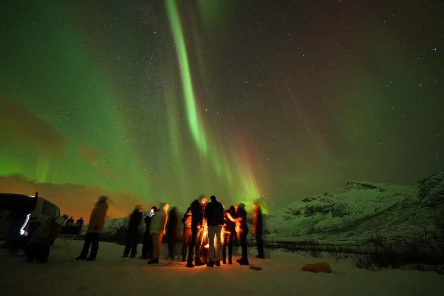 Tromsø: Chase Aurora in Minibus and Free Aurora Portrait - Warm suits help, but your clothing still matters