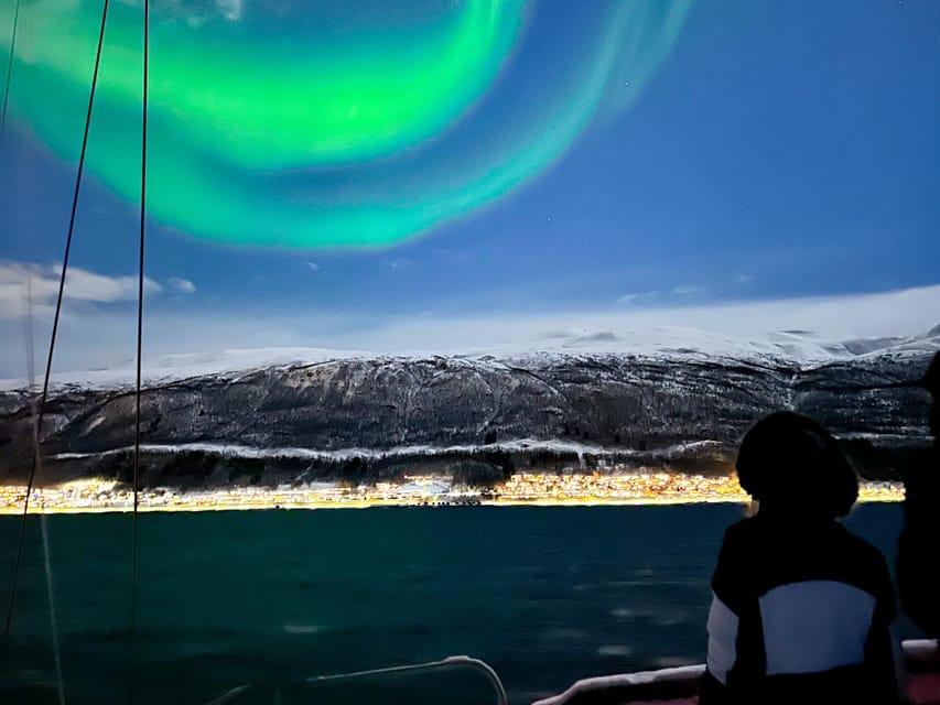 Tromso: Luxury Northern Lights Cruise with Hot Tub & Dinner - A warm saloon that saves the evening