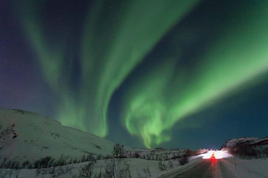 Tromsø: Northern Lights Bus Tour – Chase the Aurora Borealis - Chasing clear skies beyond the city lights
