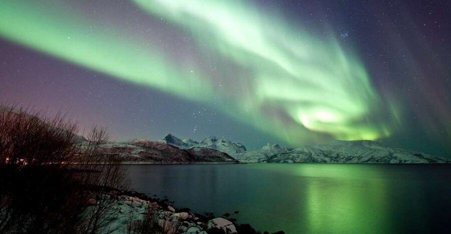Tromsø: Northern Lights Cruise with 2nd Chance Guarantee - Leaving Tromsø for the dark Arctic fjords