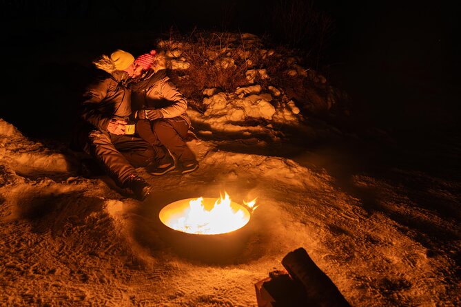 Tromsø Northern Lights with Campfire and Professional Photos - Warm clothing, icy ground, and what you must bring