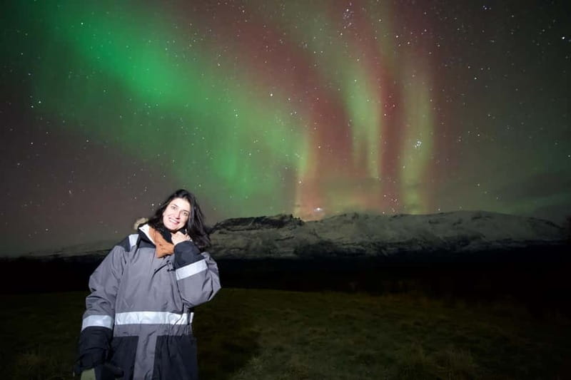 Tromsø: Small-Group Northern Lights Tour by Minibus - Thermal suits, hot drinks, and a fire in the snow