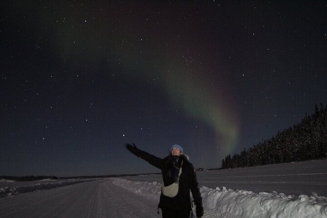 Yellowknife Aurora Hunting Tours by Bus - Prelude Lake: reflections and a clear northern horizon