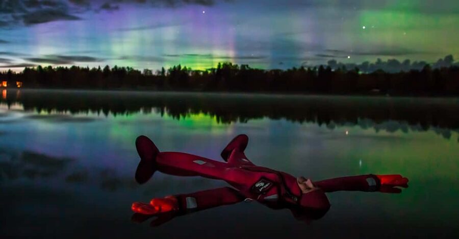 Ylläs: Northern Lights Ice-Floating Experience with Transfer - The fairy-light walk to the ice hole